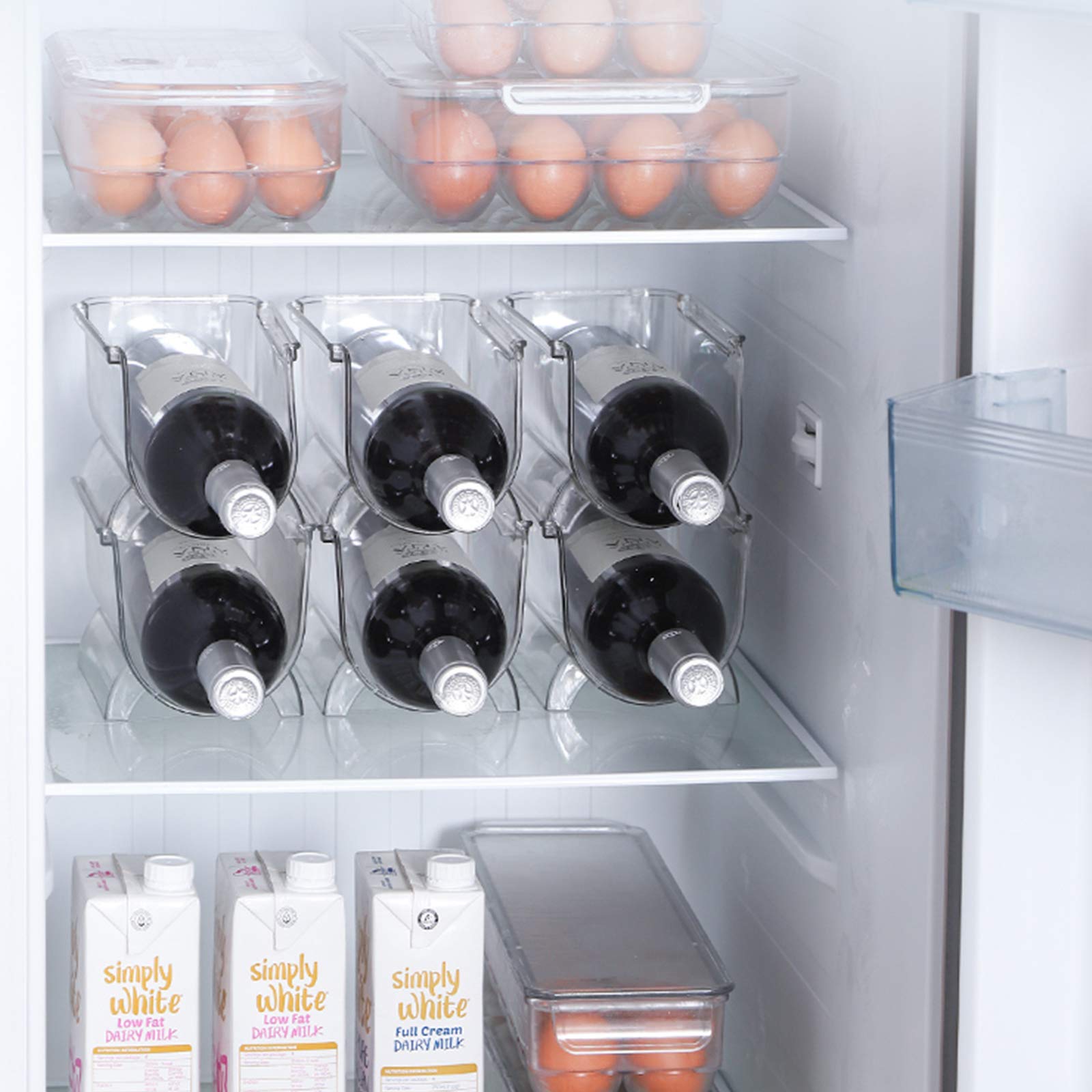 Cheeren transparent organizer prevents wine from rolling on shelves.