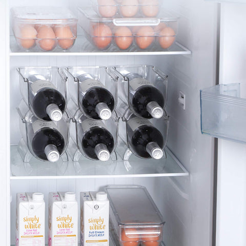 Cheeren transparent organizer prevents wine from rolling on shelves.