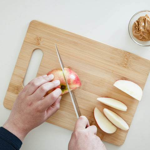 Chef Craft Select bamboo cutting board close-up shows dense fibers for durability.