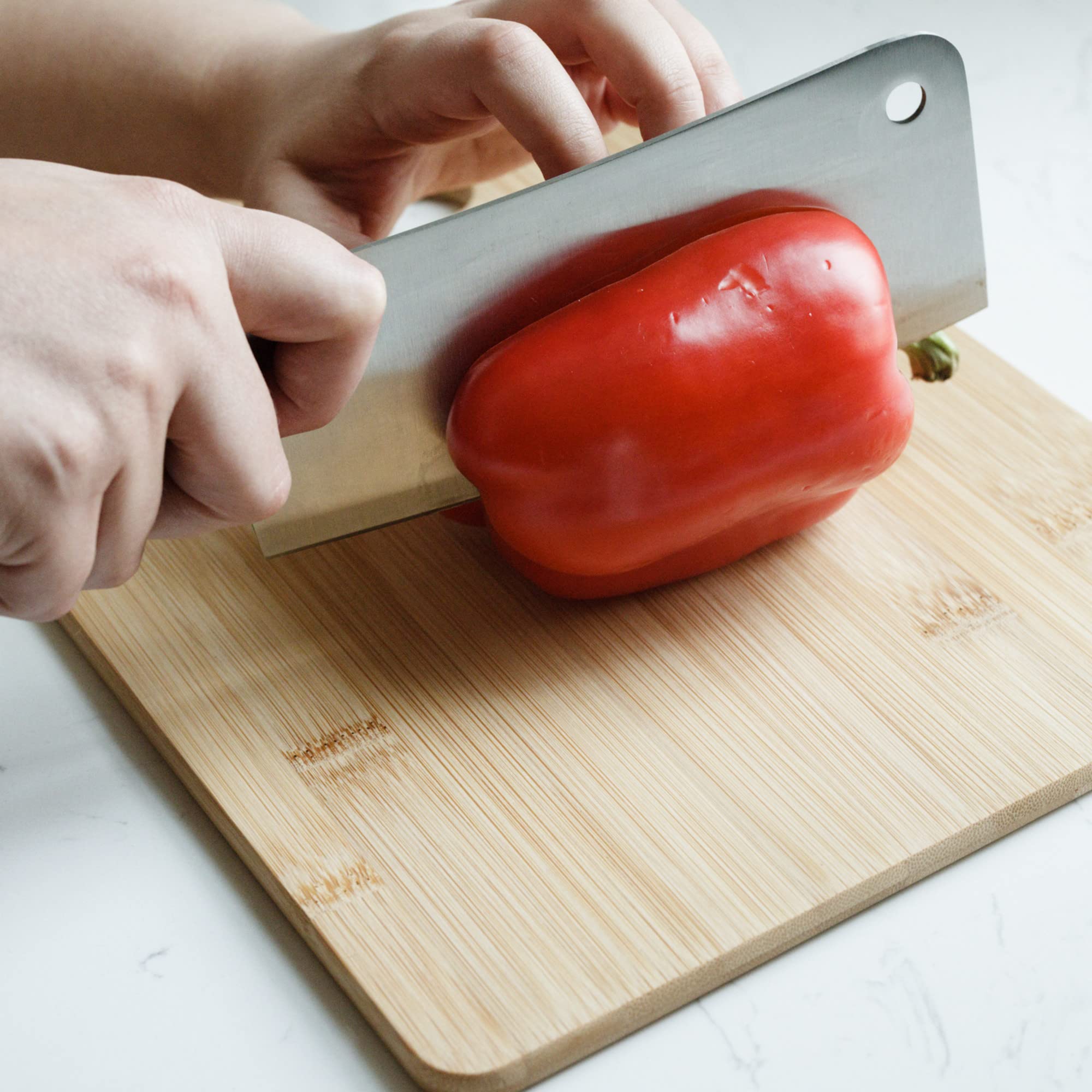 Natural bamboo finish on Chef Craft Select cutting board complements kitchen aesthetics and protects counters.