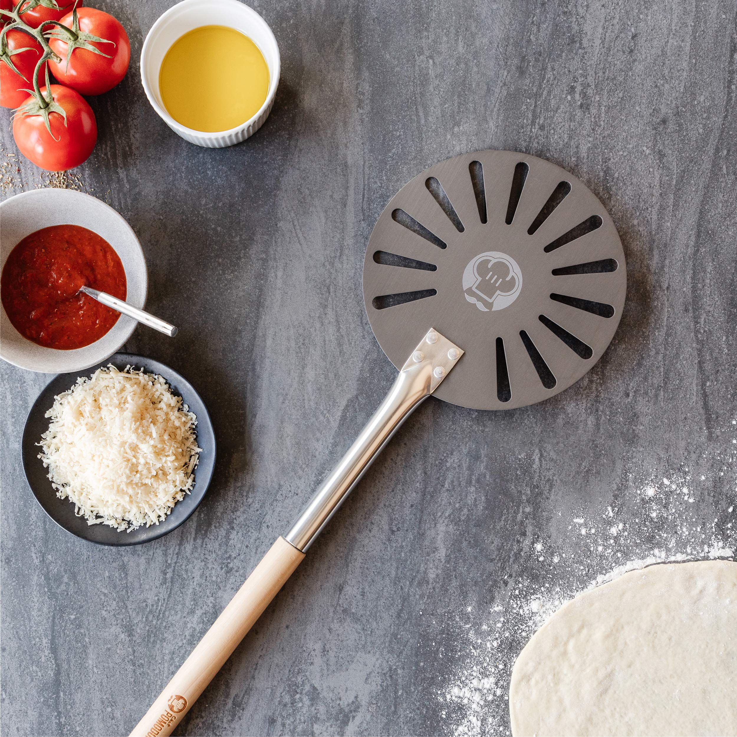 Chef Pomodoro ergonomic metal head meets comfortable wooden handle.