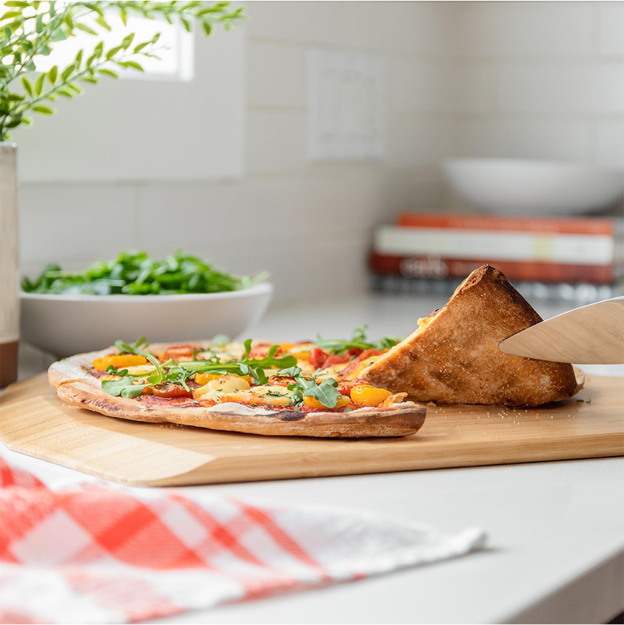 Chef Pomodoro Pizza Steel finger-hole design for safe handling.