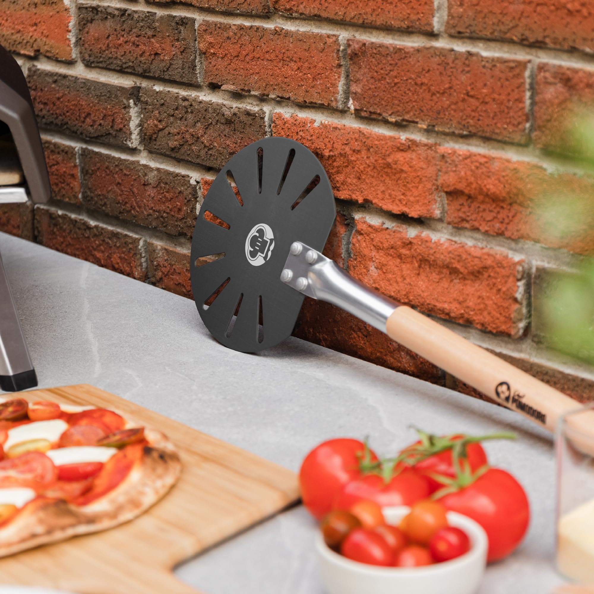 Chef Pomodoro universal compatibility fits home ovens and portable units like Ooni.
