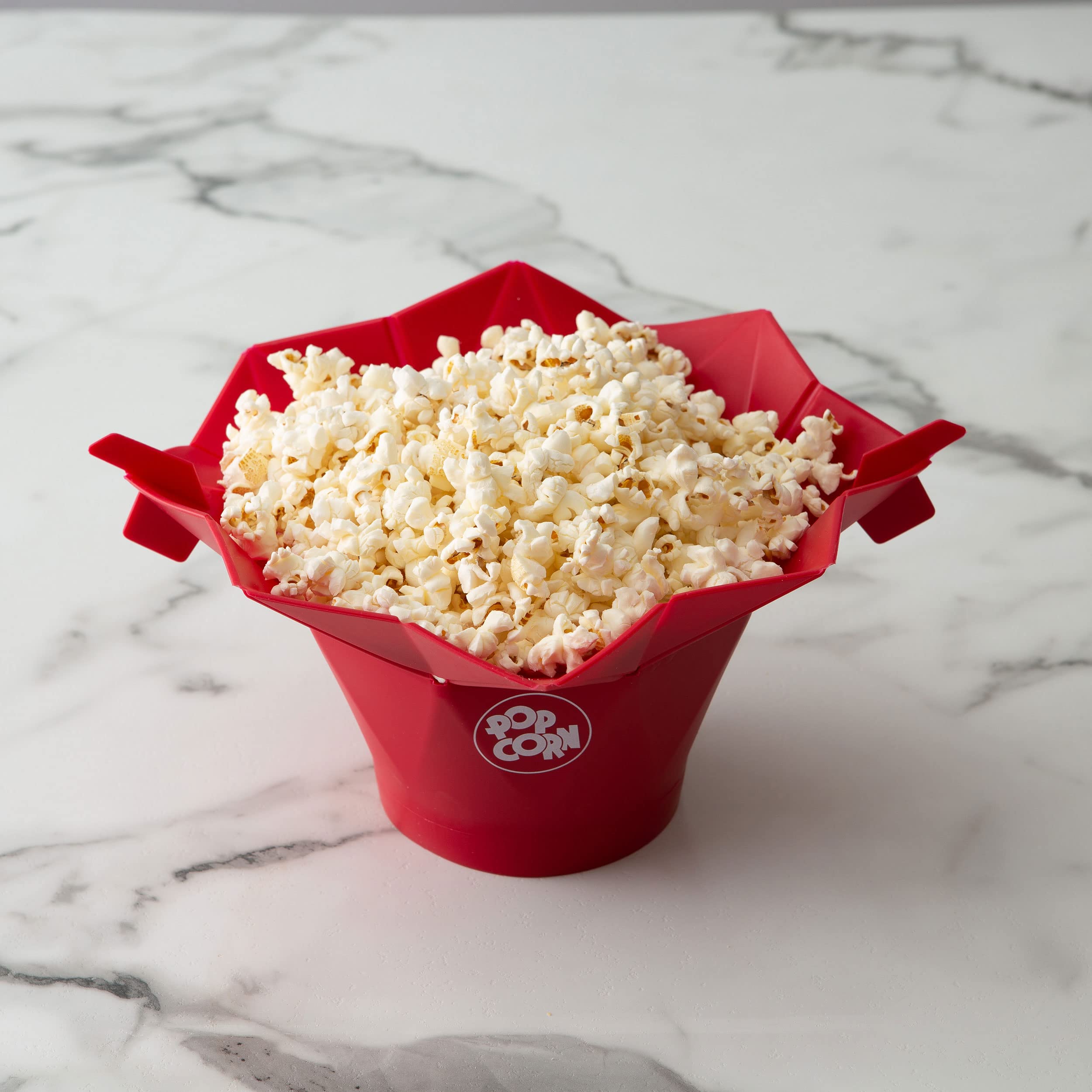 Chef'n PopTop cherry popper served with hot popcorn