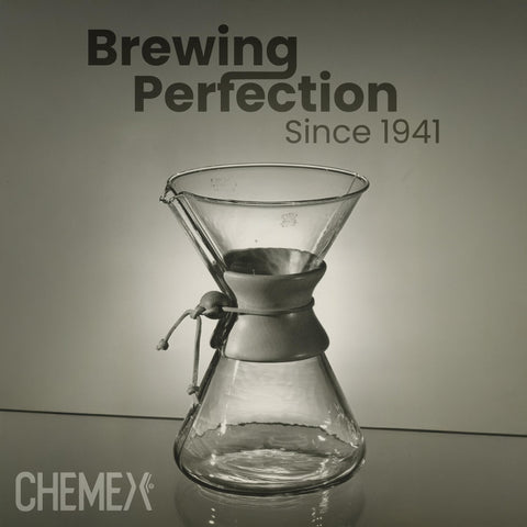 Chemex clear glass carafe showcases brewed coffee as it blooms.