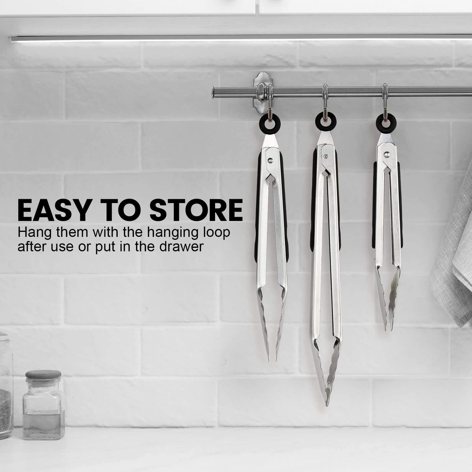 Chengu grill tongs with thumb grip for easy control.