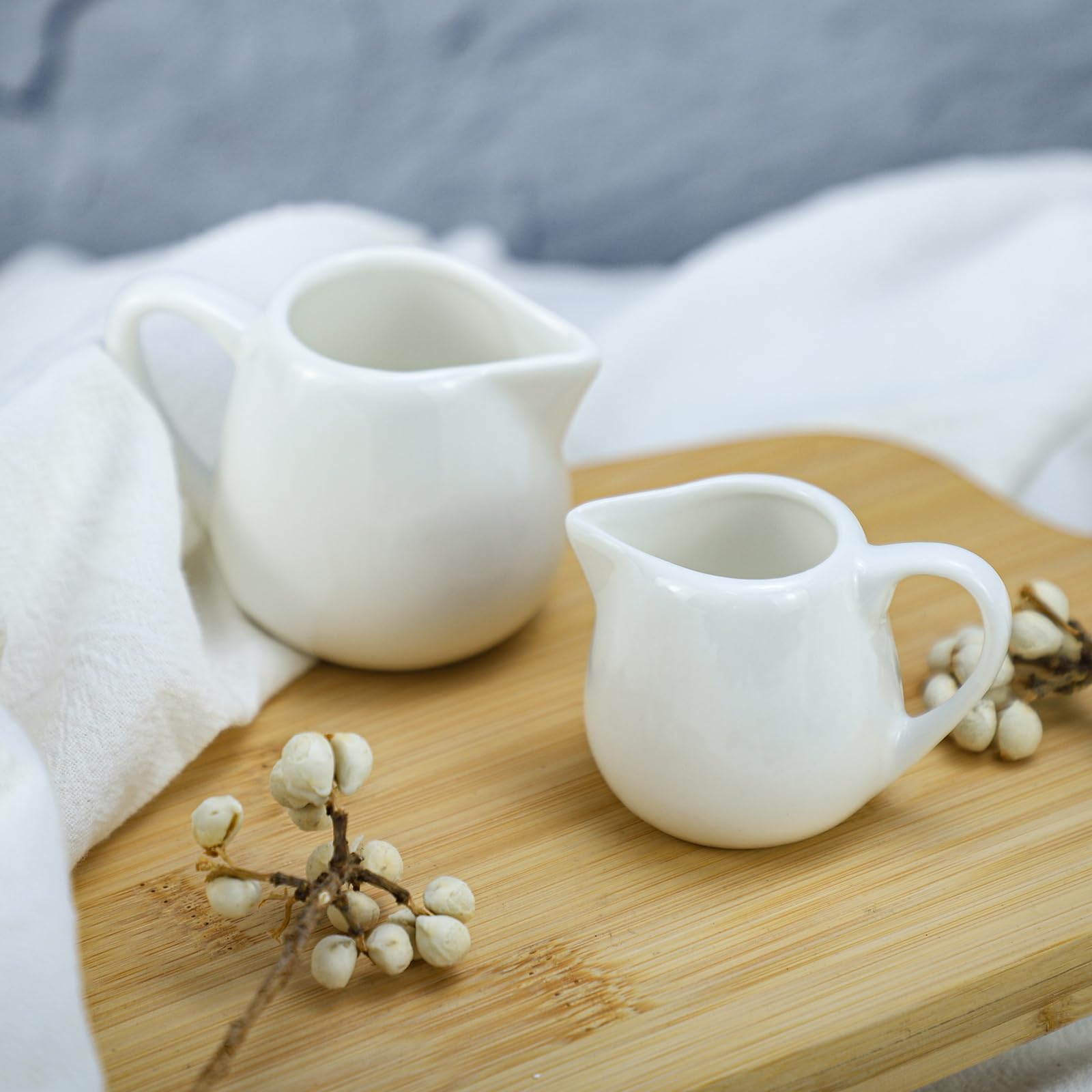 CHOOLD ceramic creamer featuring a comfortable grip handle for easy use.