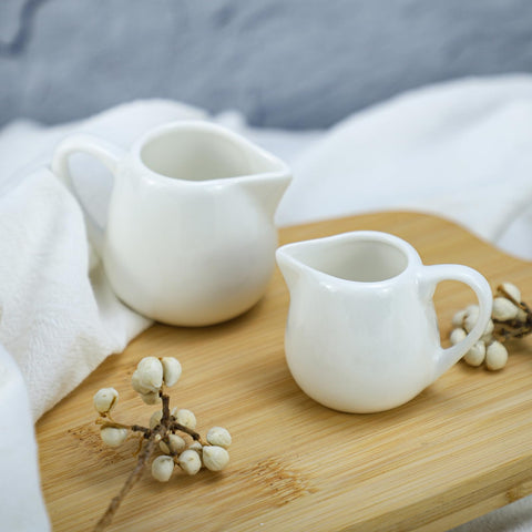 CHOOLD ceramic creamer featuring a comfortable grip handle for easy use.