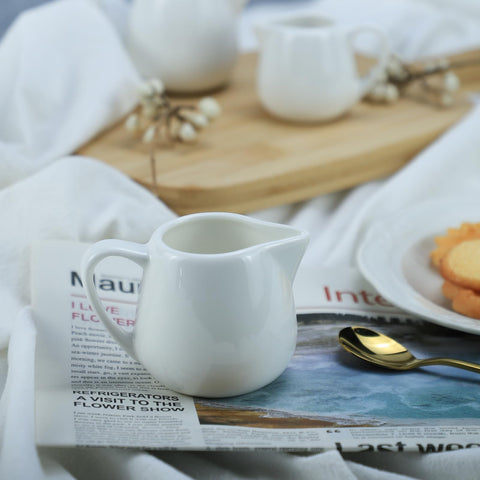 CHOOLD two-piece ceramic creamer set in pure white for versatile serving.