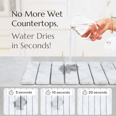 Chrome Club Stone Drying Mat demonstrates fast absorption on a kitchen counter.