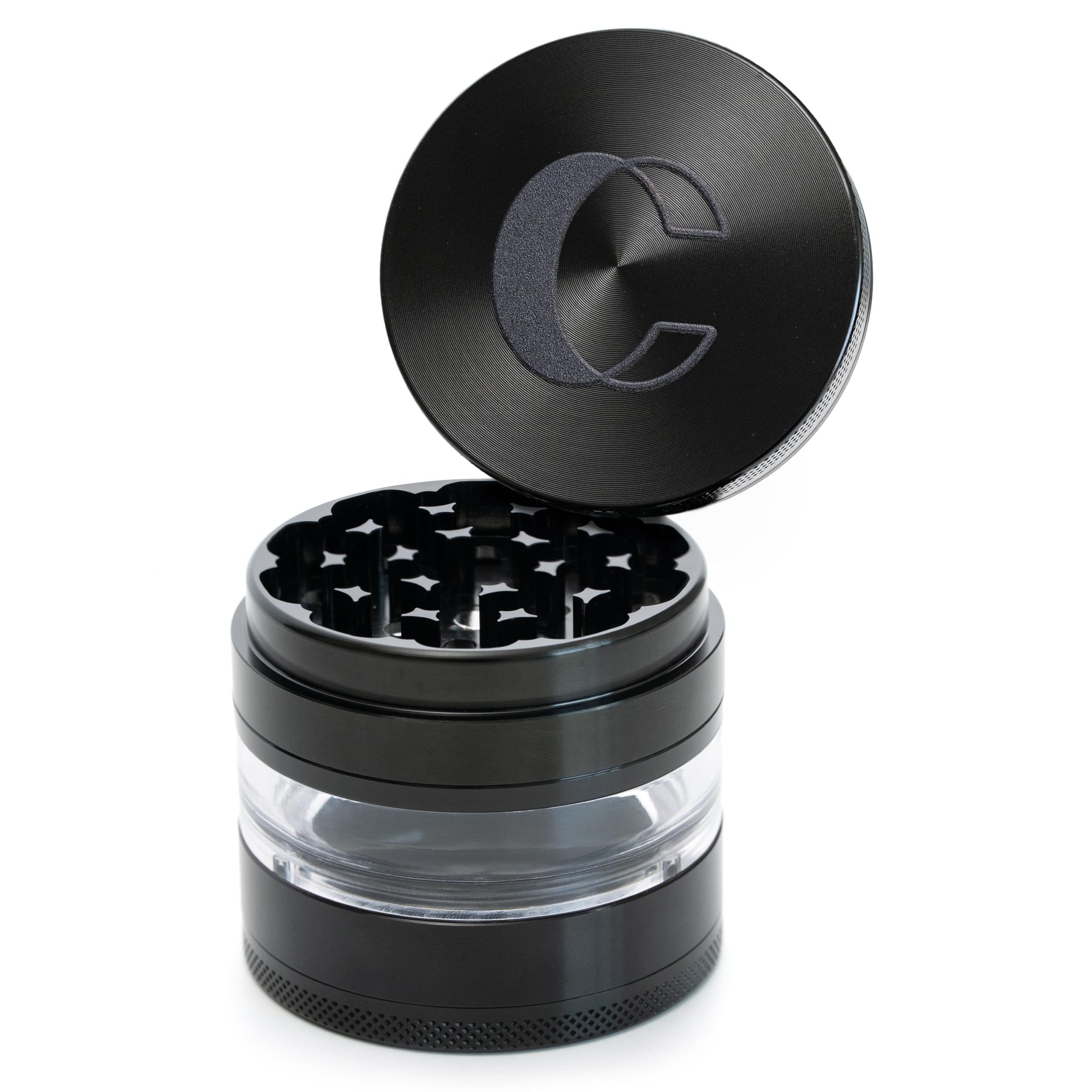 Cinder Brands Clear Cut 4-Piece Grinder viewed from top, compact and portable for quick grinding