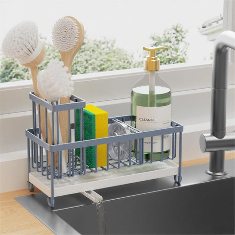 Cisily sponge holder with rotatable spout directs water into the sink, reducing countertop mess.