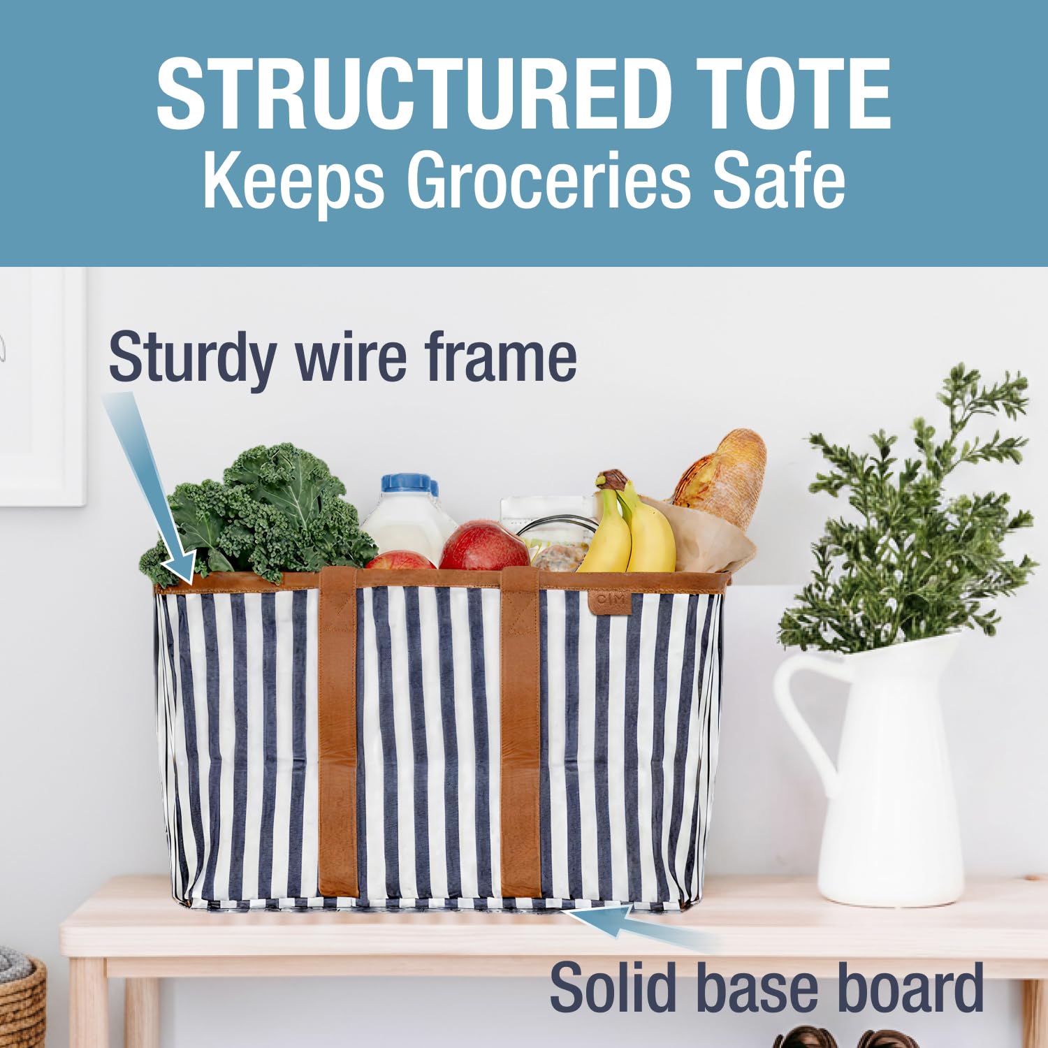 CleverMade Luxe Tote navy-striped, folded flat for compact storage and travel.