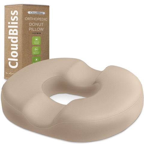 CloudBliss donut pillow shows ergonomic U-gap for tailbone relief.