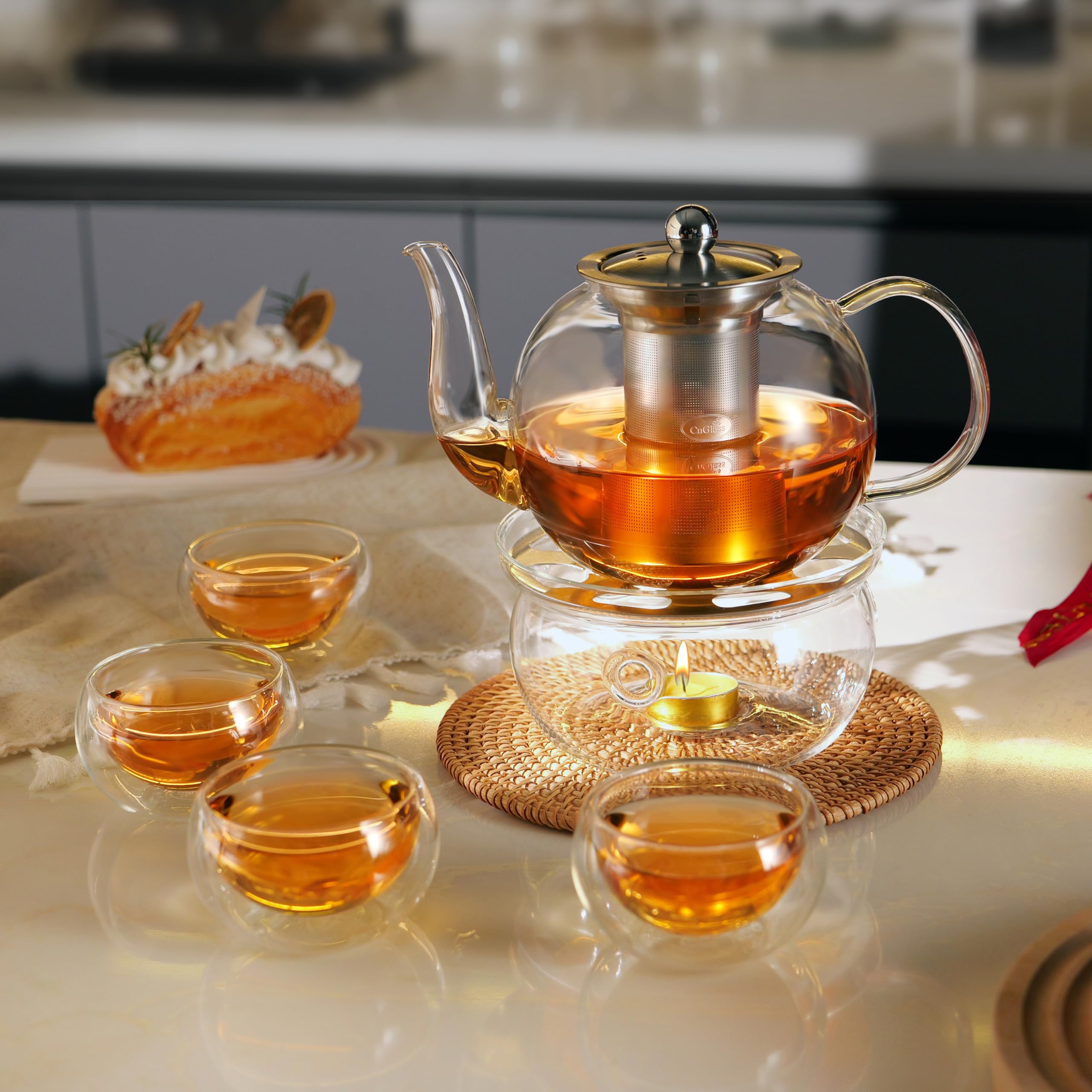 CNGLASS 40oz teapot supports blooming and loose-leaf teas via removable infuser.