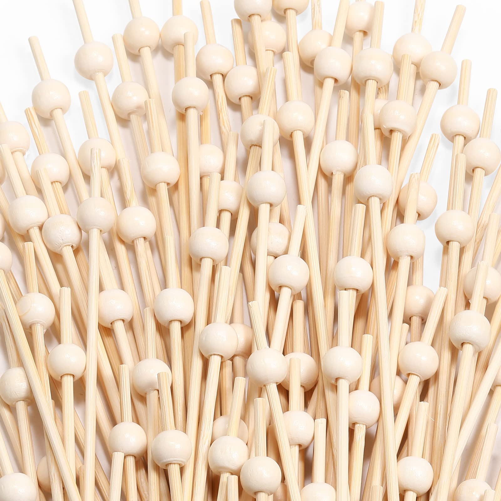 CockStixs bamboo cocktail picks highlight 4-7 inch length for elegant drinks and presentations.