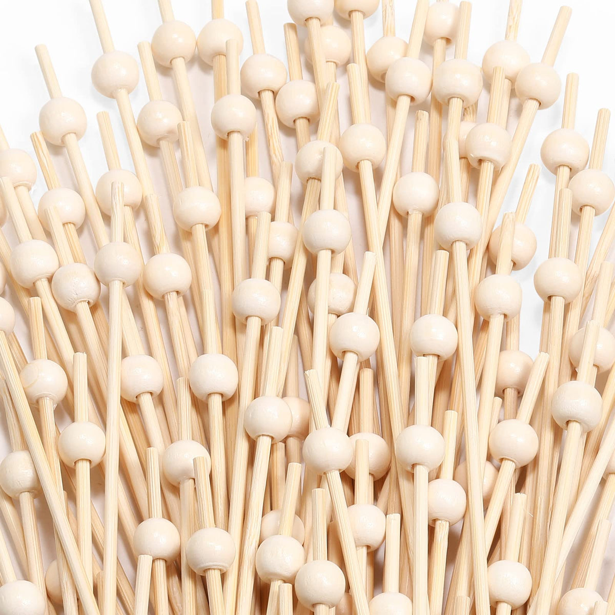 CockStixs bamboo cocktail picks highlight 4-7 inch length for elegant drinks and presentations.