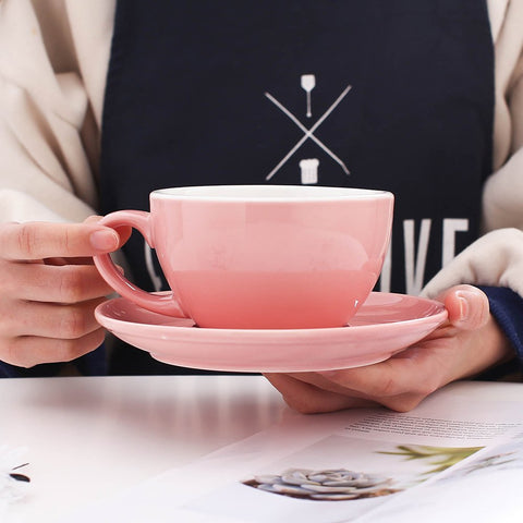 Coffeezone latte art saucer in glossy pink pairs with cup for stylish presentation.
