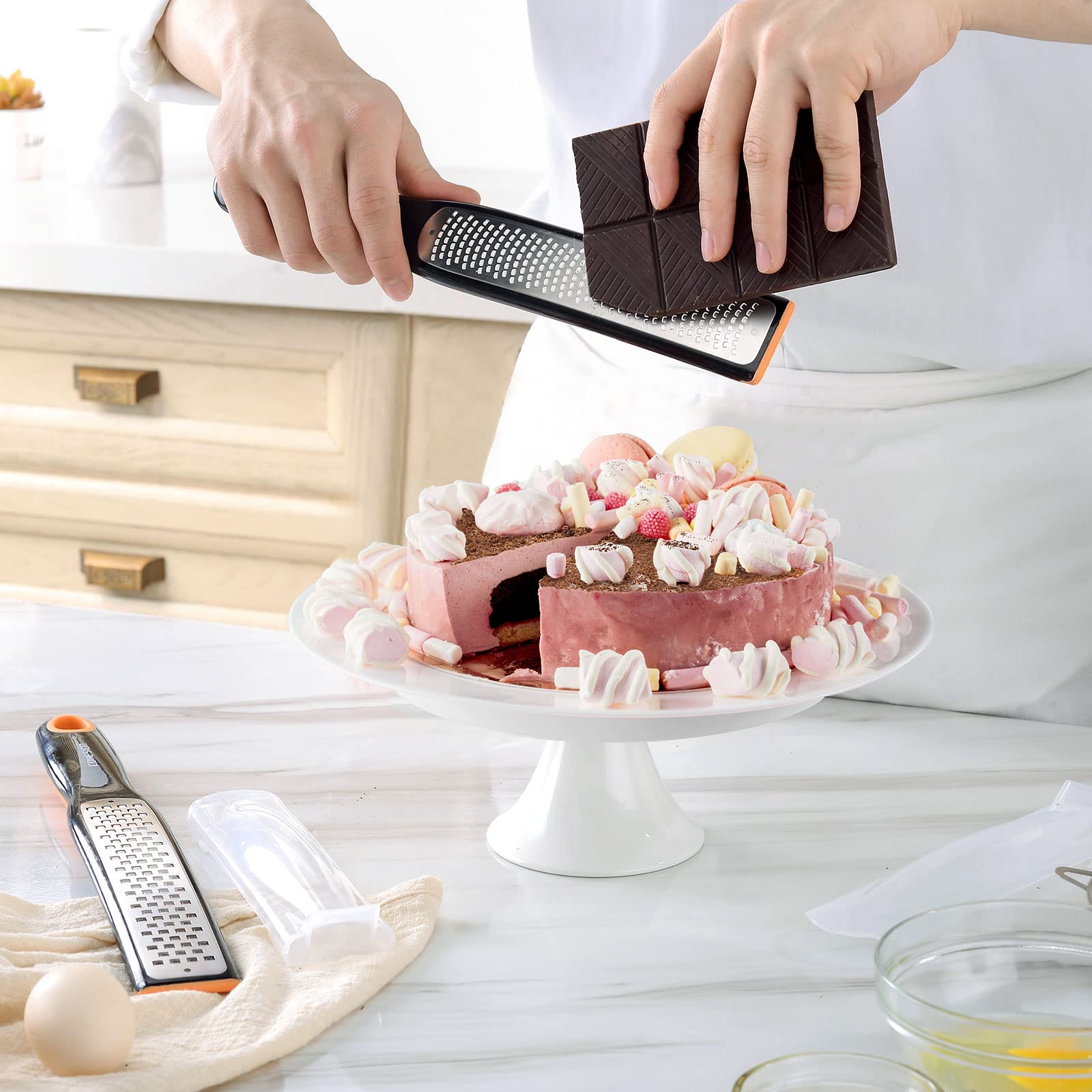Cohesion etched zester-grater produces vegetable shavings for easy prep