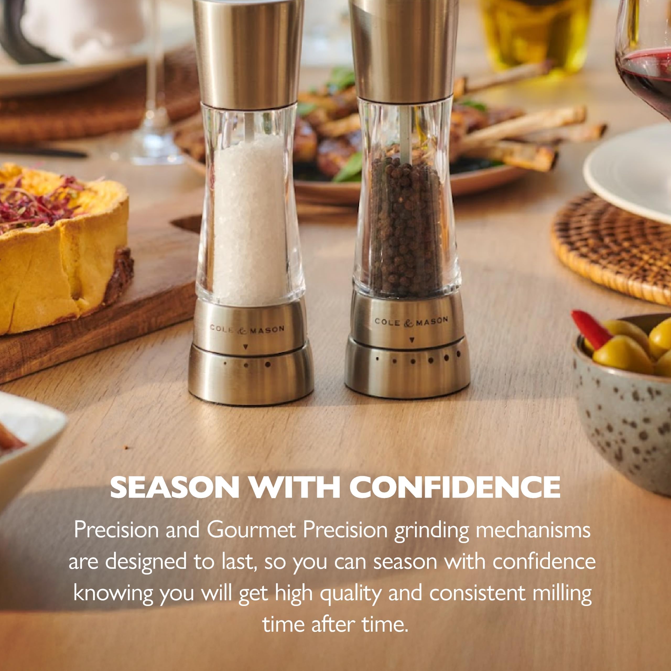 Cole & Mason Derwent pepper mill in use over dish for fresh pepper.