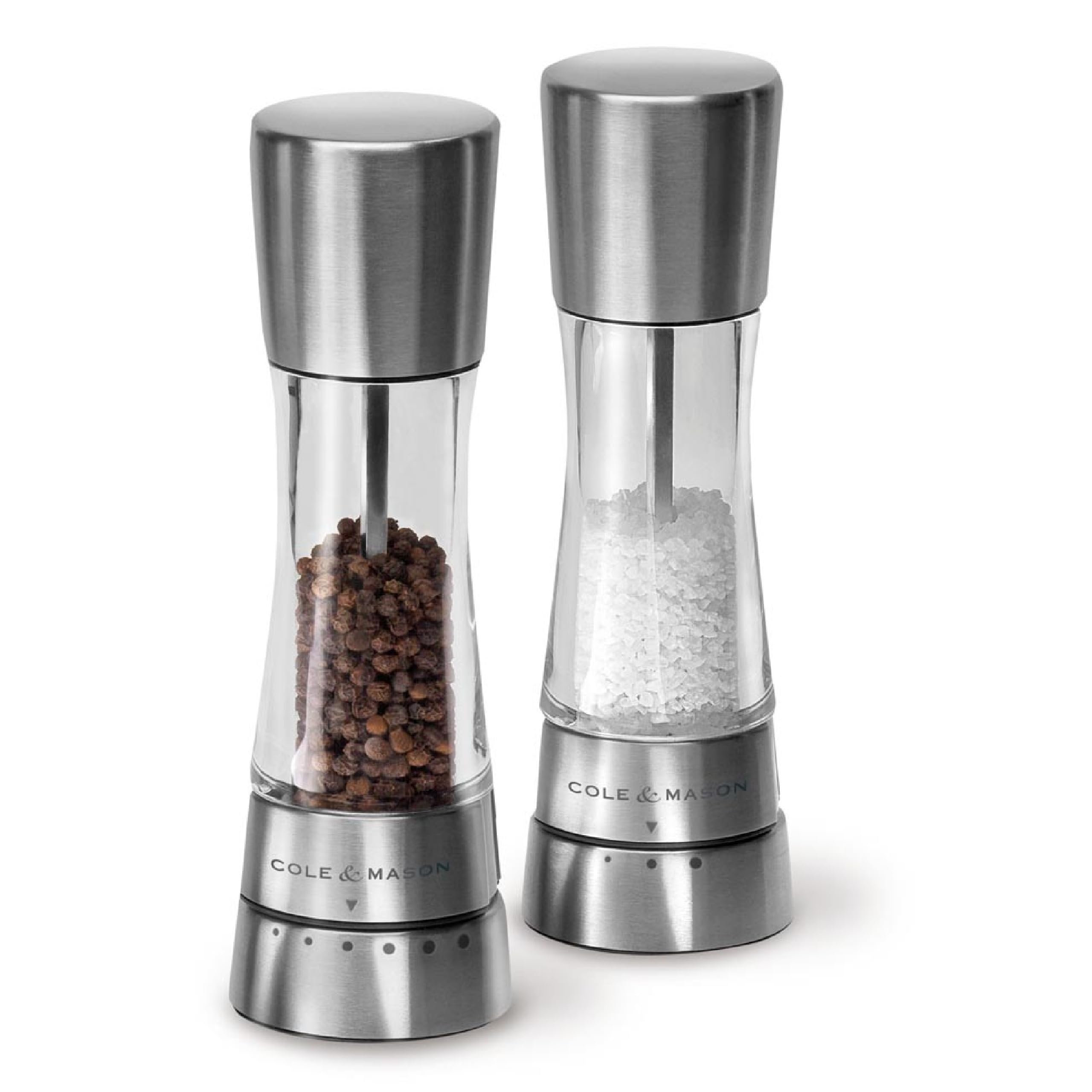 Cole and Mason Derwent salt and pepper mills on a dining table for effortless seasoning.