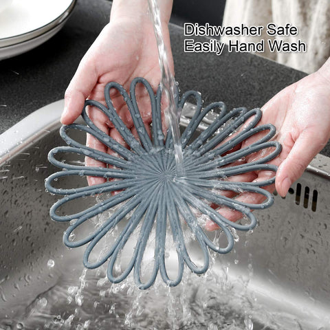Colinda three-design trivet set adds style to kitchen surfaces.