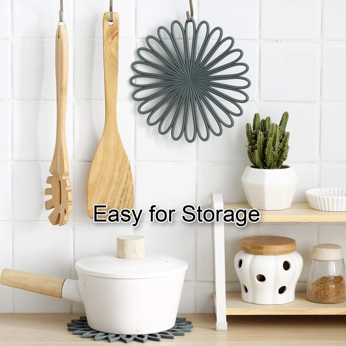 Colinda silicone pot holders protect tables during serving.