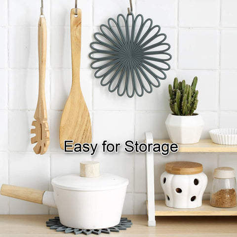 Colinda silicone pot holders protect tables during serving.