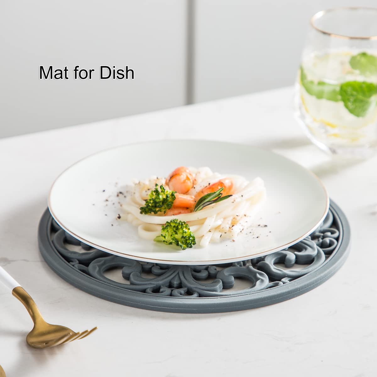 Colinda teal silicone trivet is dishwasher safe for easy cleaning after cooking