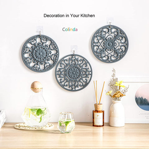 Colinda malachite-green trivet adds decorative style to kitchen decor.