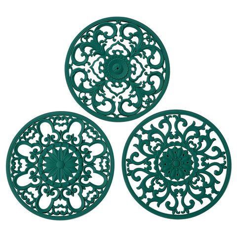 Colinda malachite-green trivet demonstrates heat resistance for hot dishes.