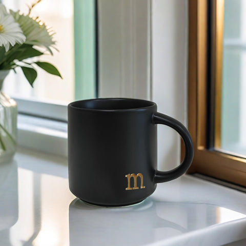 COLLECTIVE HOME Elegant gold-plated alphabet design accents morning routines.