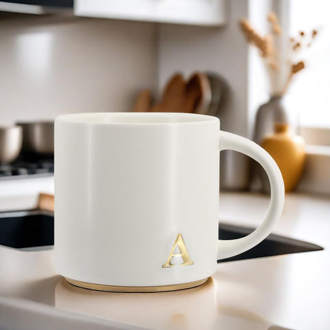 COLLECTIVE HOME monogram mug with gift-ready packaging.