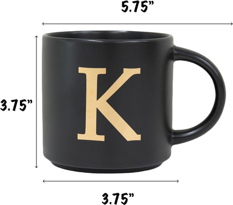 COLLECTIVE HOME gold-letter mug detail, close-up on shimmering initial.