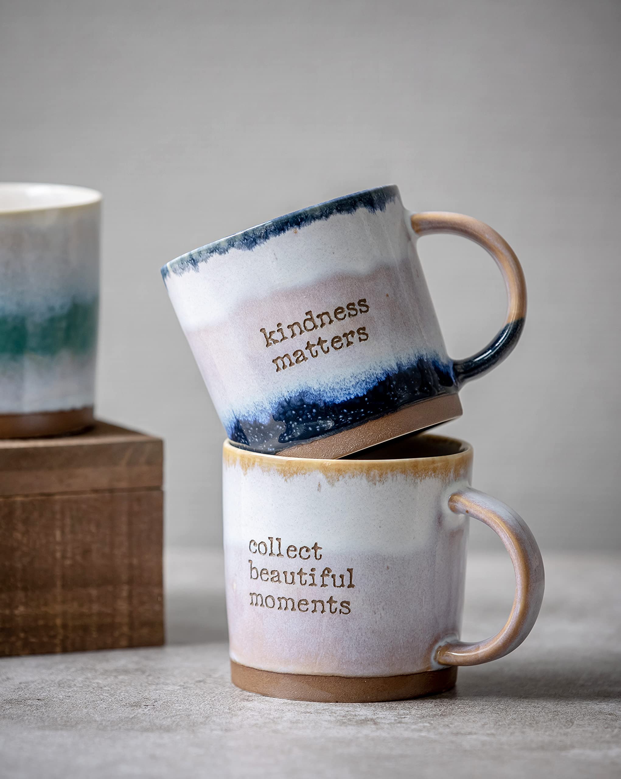 COLLECTIVE HOME Reactive Glaze mug in use with coffee, suitable for hot or cold drinks.
