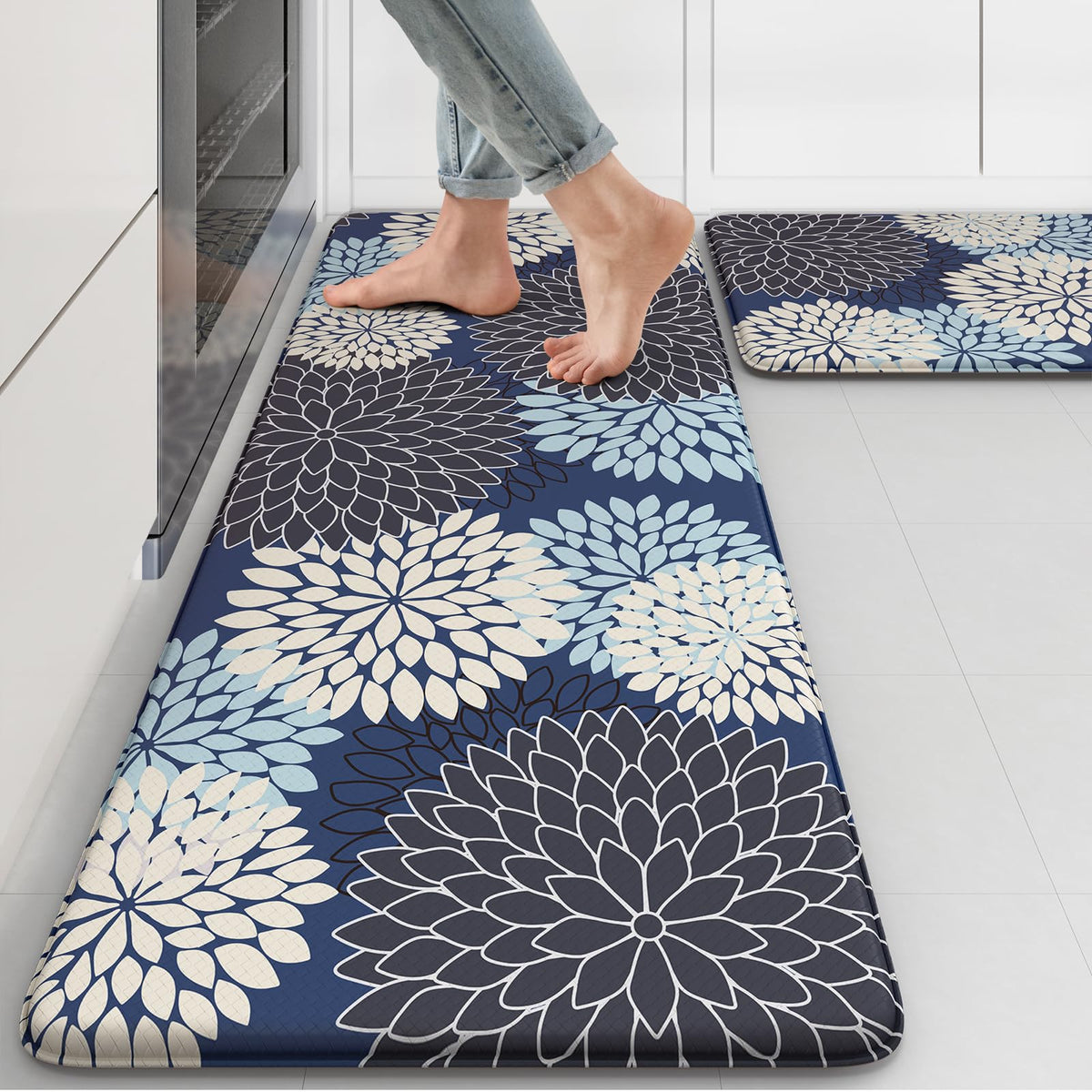 Collive anti-fatigue kitchen mat with blue floral pattern offers cushioned comfort for cooking.