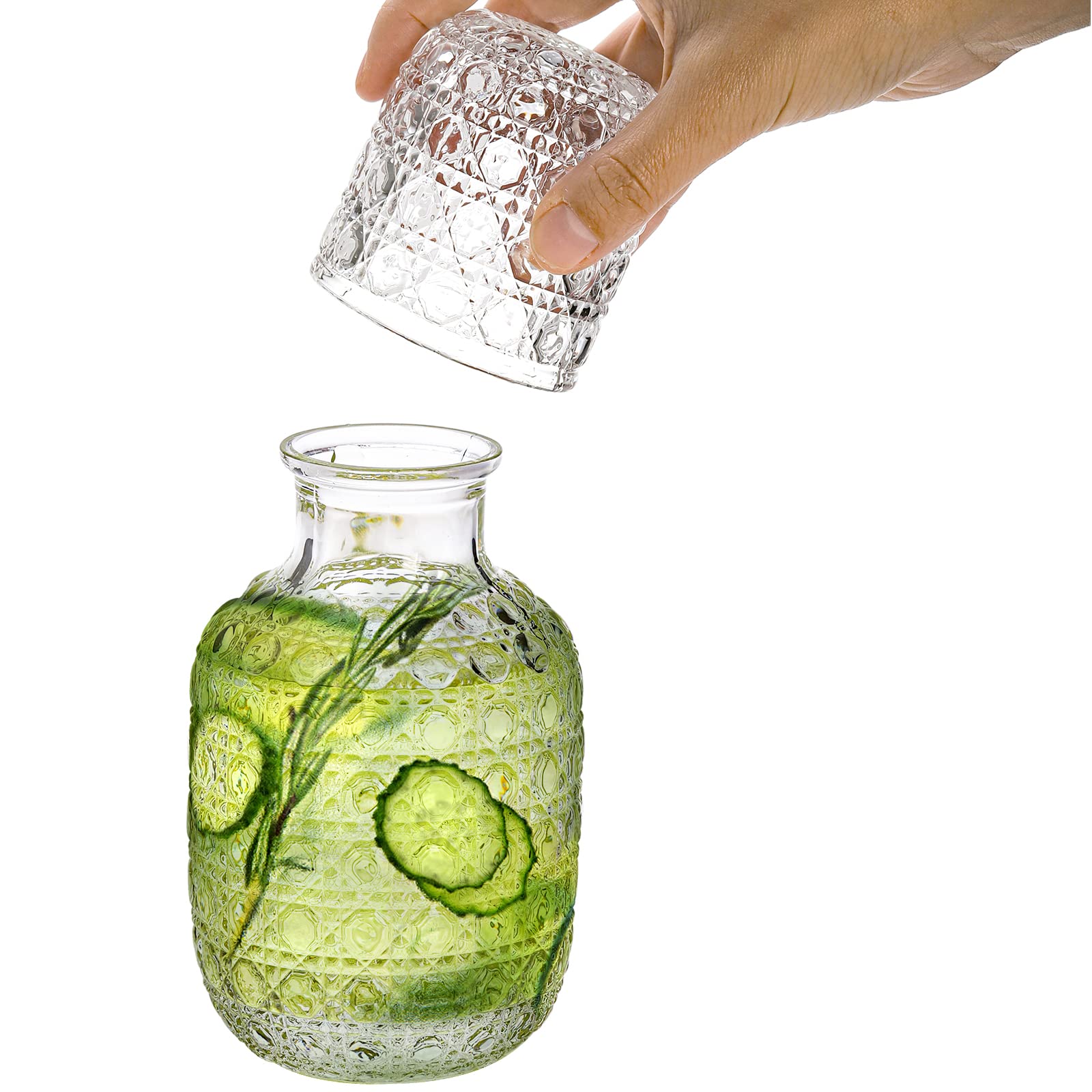 Coloch patterned glass carafe with carved detail for kitchen aesthetics.