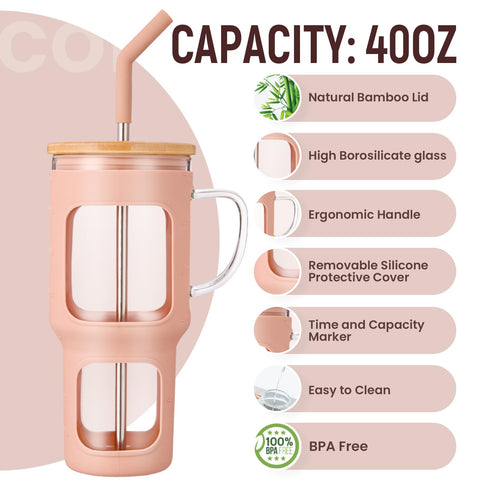 COMOOO tumbler with silicone sleeve for secure grip and spill prevention.