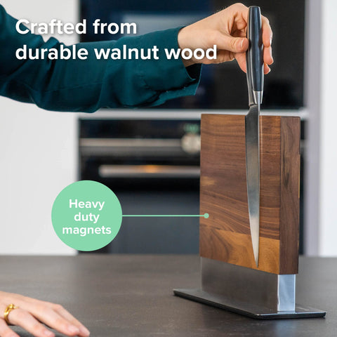 Coninx walnut knife stand with anti-slip base stays steady on the counter.