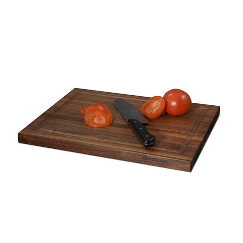 CONSDAN Black Walnut Cutting Board juice groove captures liquids to protect counters.