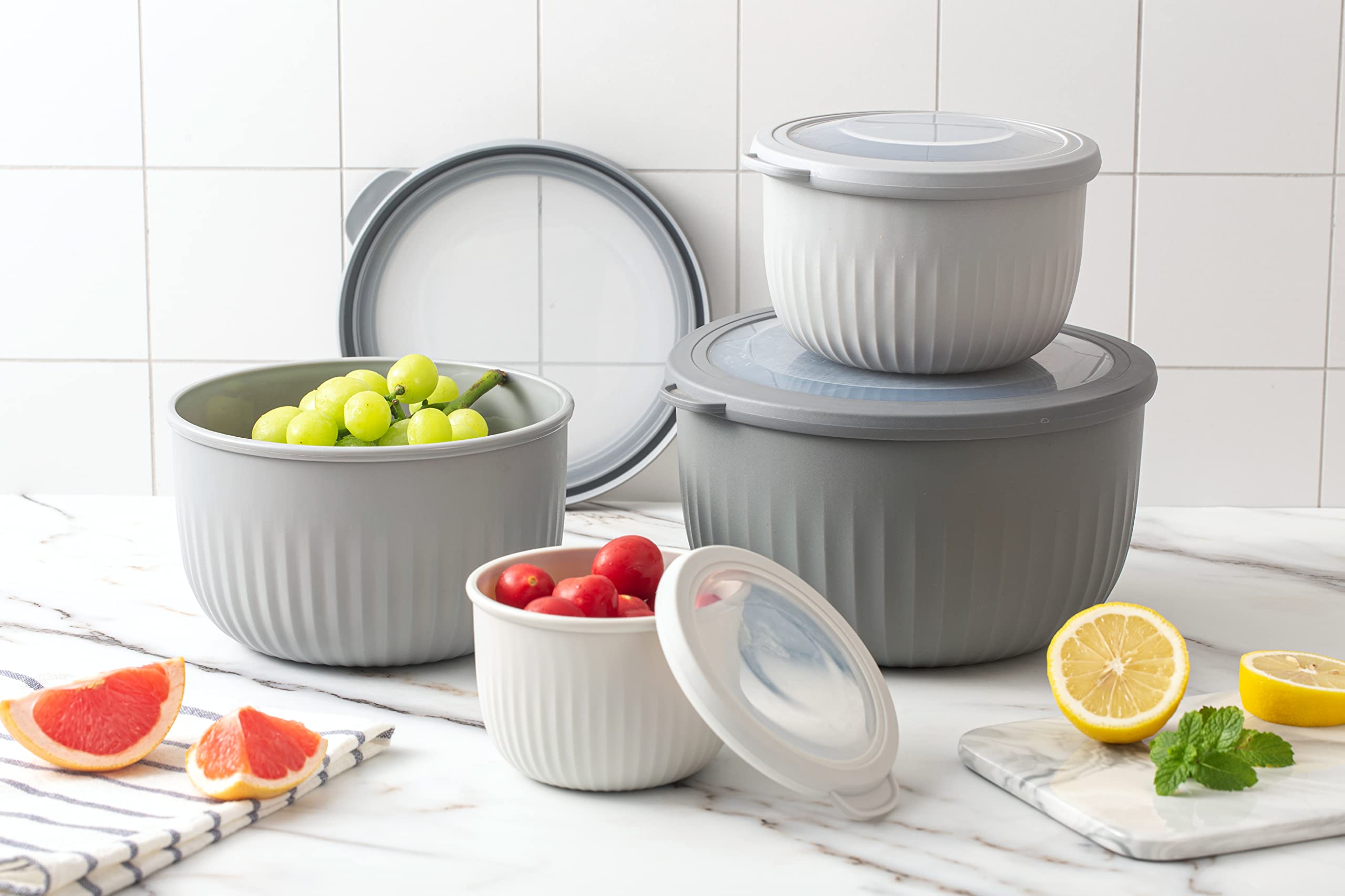 COOK WITH COLOR nesting design reduces cabinet clutter in busy kitchens.