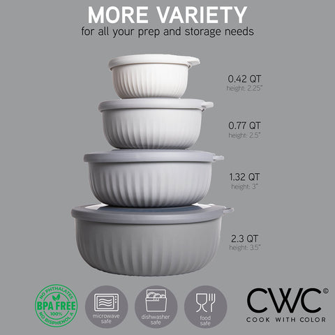 COOK WITH COLOR bowls with lids shown nesting for space-saving storage.