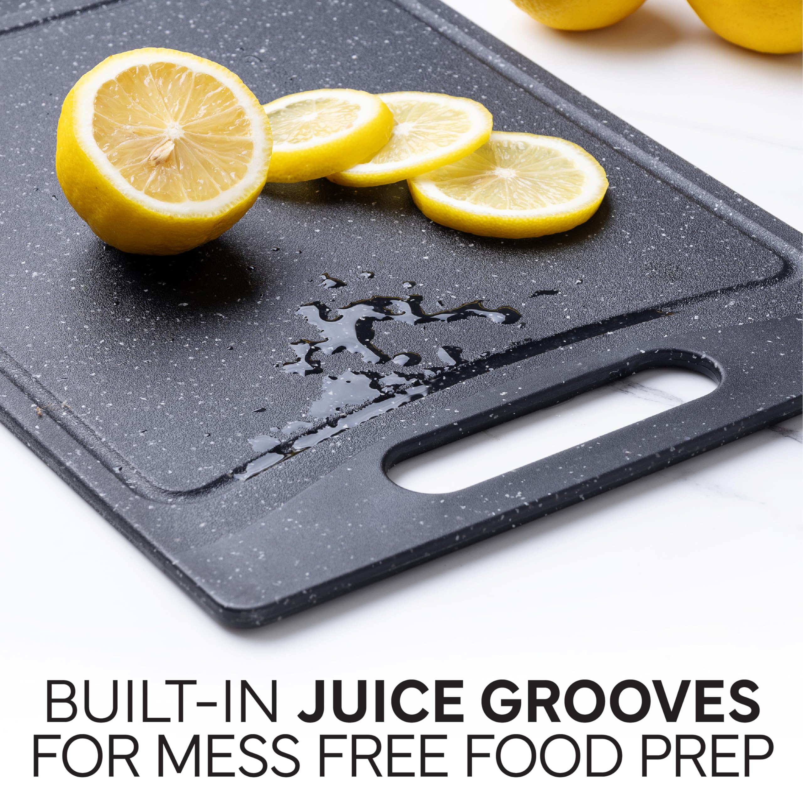 Cook with Color cutting board with non-slip feet for stability.