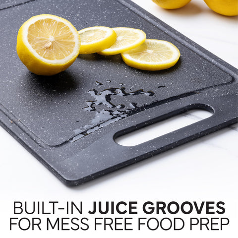 Cook with Color cutting board with non-slip feet for stability.