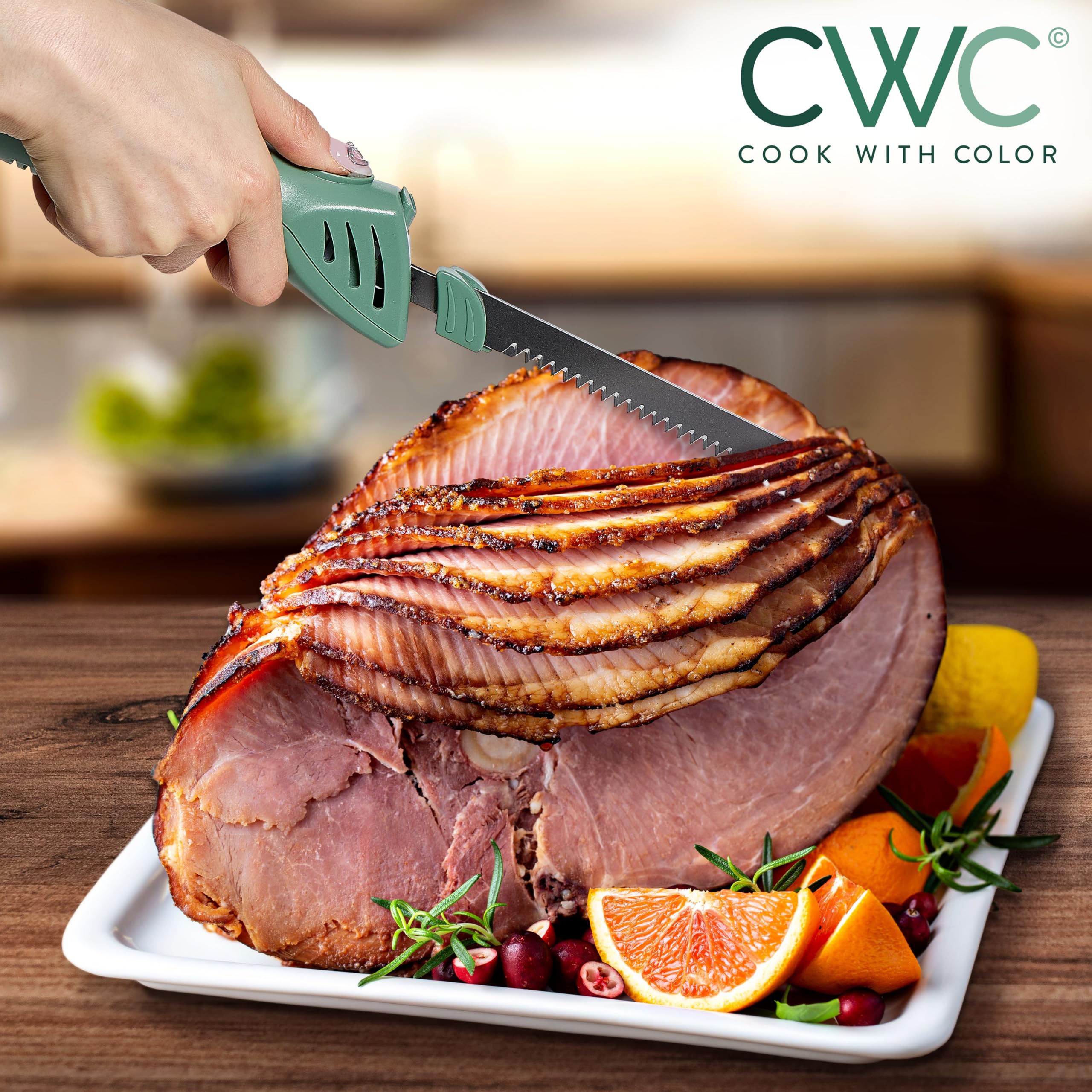 COOK WITH COLOR Electric Knife blade release button enables easy blade changes.
