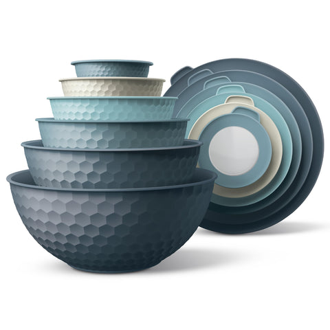 COOK WITH COLOR mixing bowls nest for compact storage and easy prep.