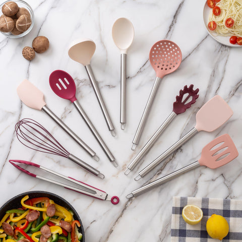 COOK WITH COLOR silicone slotted spoon in rose for safe stirring.