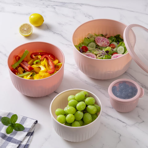 COOK WITH COLOR small and medium bowls with lids offer versatile portions.