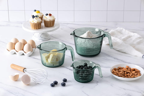COOK WITH COLOR two cup glass measuring cup featuring easy pour and measurements