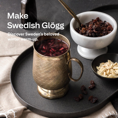 Cooking Gift Set mulled wine kit wine glass pairing shows festive table setup.